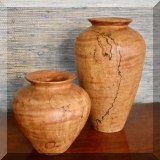 D04. Signed handturned burlwood vases. 